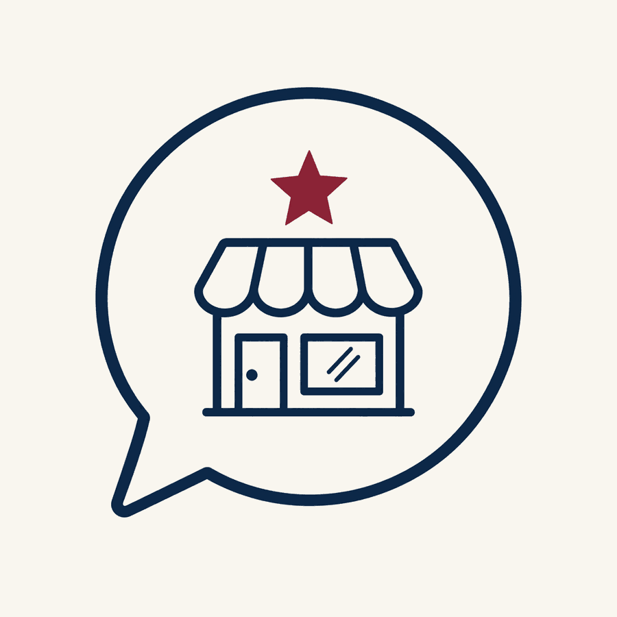 A speech bubble containing a small storefront with an awning and a burgundy star above it, illustrating an AI search tool recommending a local business by name